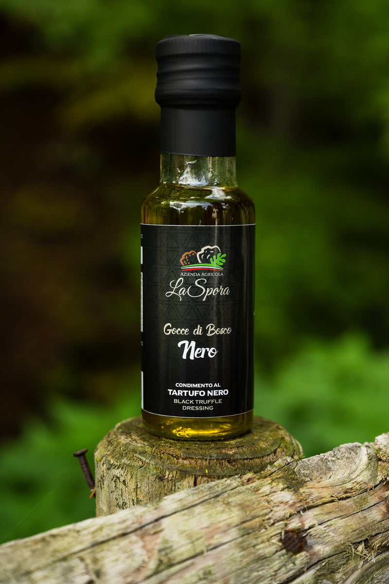 Dressing based on extra virgin olive oil with black truffle