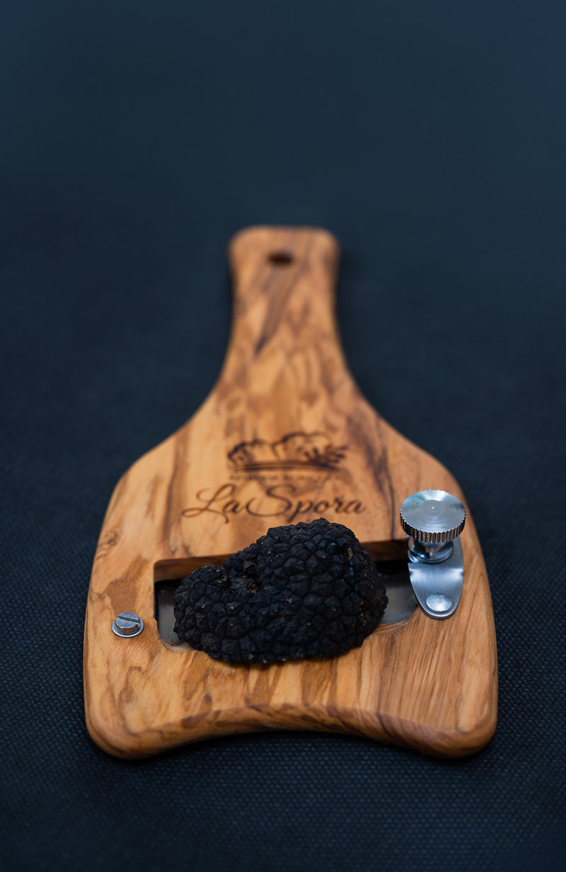 Stainless steel truffle slicer with wooden handle