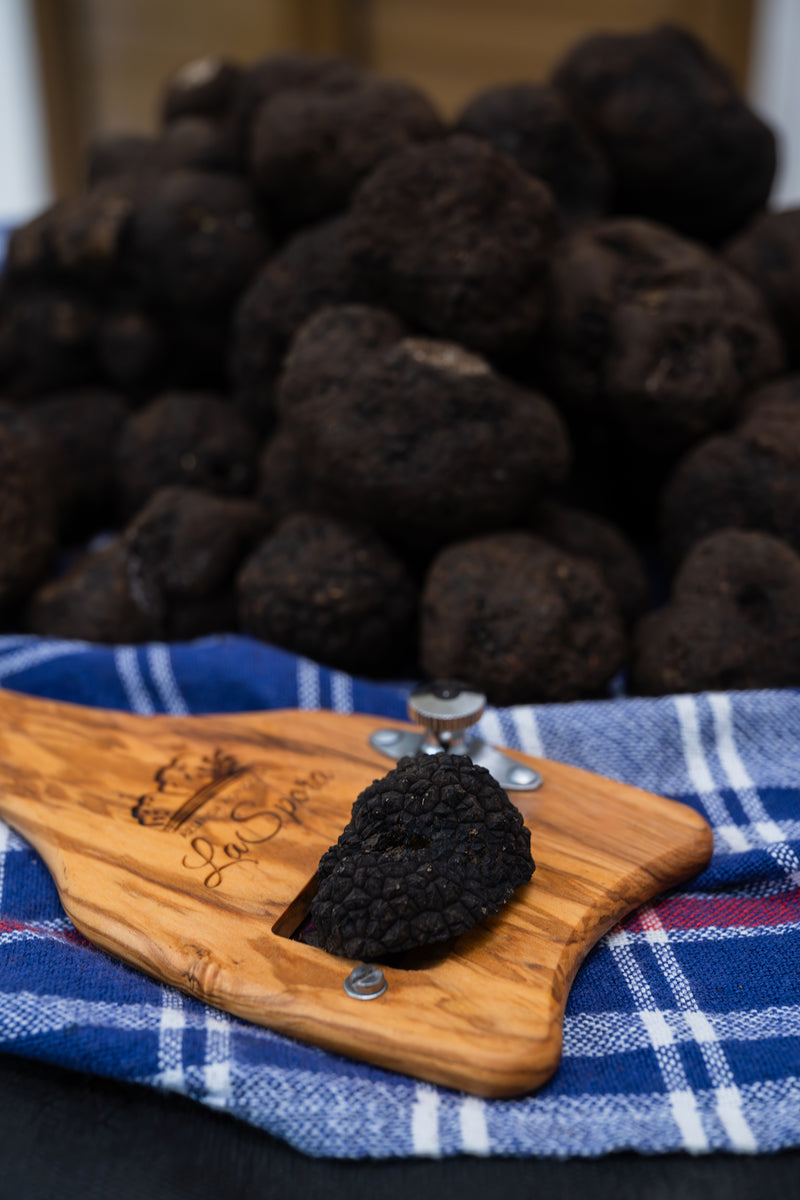 Stainless steel truffle slicer with wooden handle